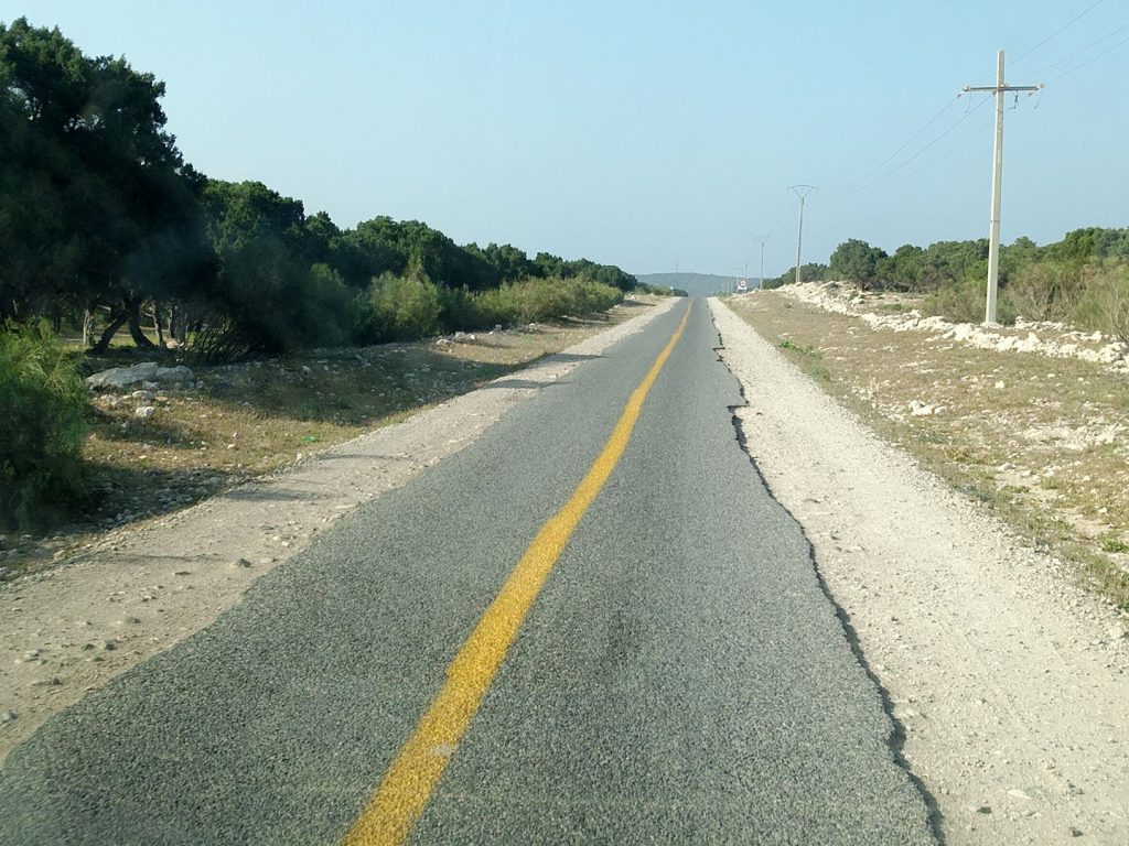 a broken road in Morocco
